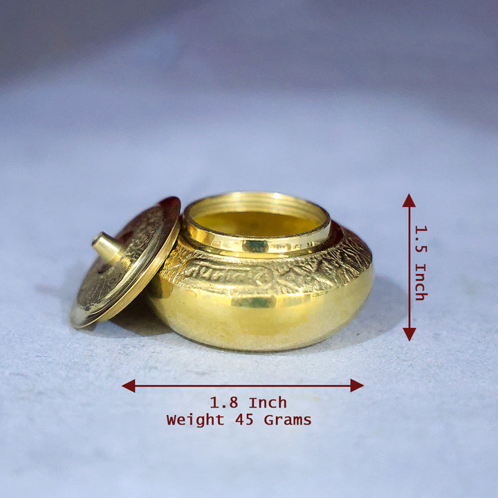 Brass Kumkum Dabbi Embossed Mila – A Sacred Container for Devotional Offerings