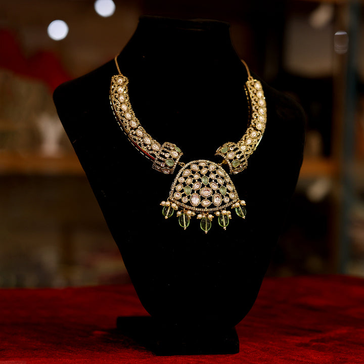 Elegant Green Kundan Necklace with Matching Jhumka Earrings
