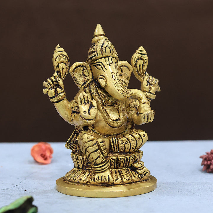 4" Brass Ganeshs with Round Base and Yellow Antique Finish