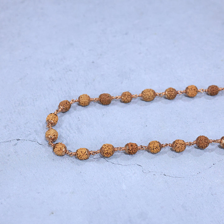 Rudraksha Mala With Copper Cappings